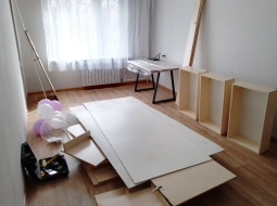 Подняли шкаф и передвинули мебель